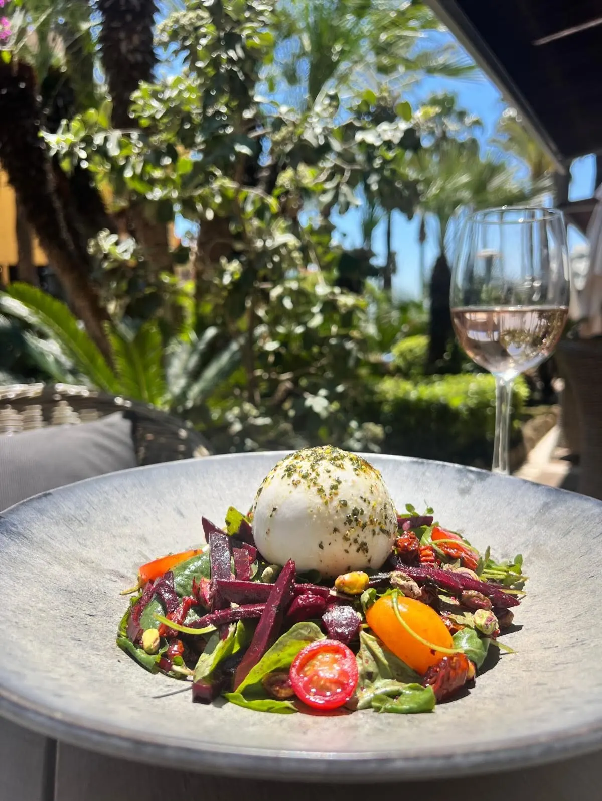 Burrata with beetroot, tomatoes and minted pesto