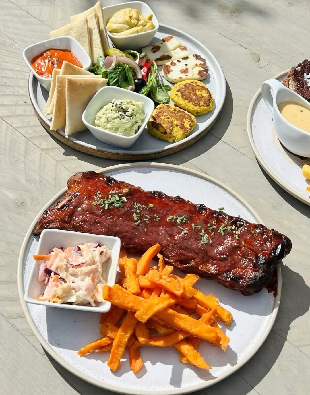 Bourbon glazed ribs with sweet potato fries and slaw